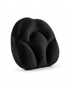 Black ergonomic egg-shaped neck support pillow on white studio background