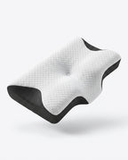 White quilted contoured cervical memory foam pillow with black mesh sides, studio shot