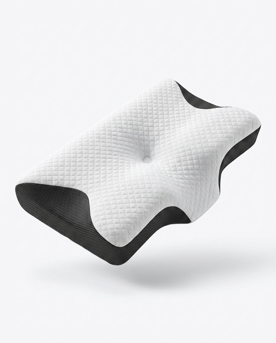 White quilted contoured cervical memory foam pillow with black mesh sides, studio shot