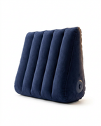 Navy blue inflatable wedge support pillow with ribbed channels, studio shot on white
