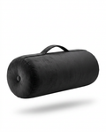 Black velvet meditation bolster with carry handle, studio packshot on white
