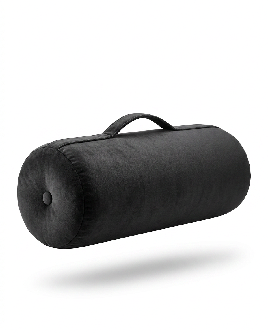 Black velvet meditation bolster with carry handle, studio packshot on white