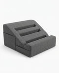 Grey grooved wedge bed support pillow, studio packshot on white