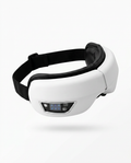 White eye massager with adjustable black strap and control panel, studio shot
