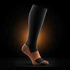 Black copper compression sock on a dark backdrop with amber glow