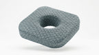 Grey honeycomb ear piercing pillow with center cavity, studio shot on white