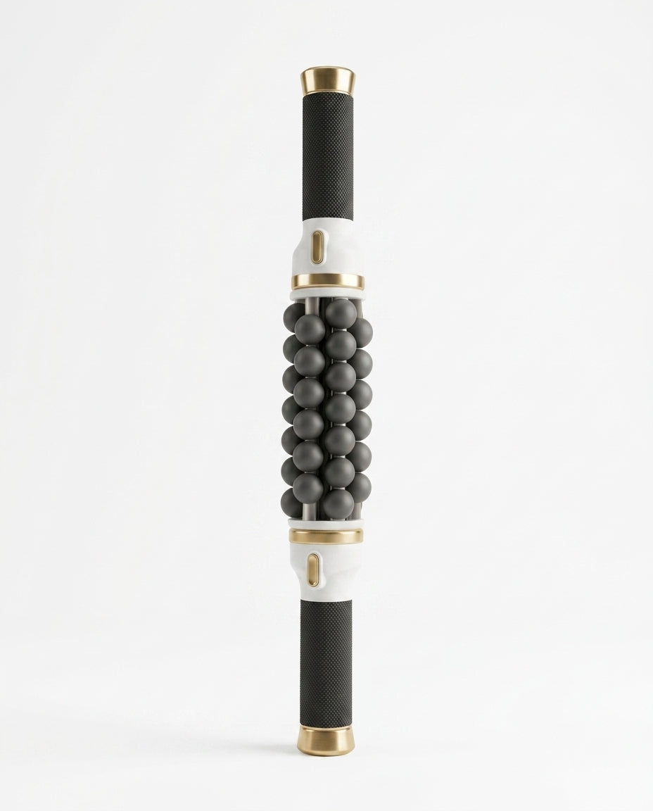 Electric rolling massage stick with black balls and gold caps on white