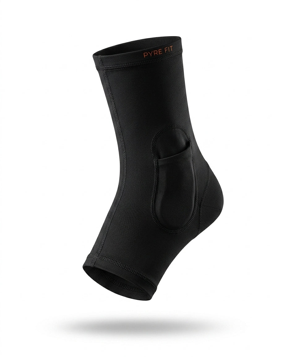 Black cooling compression ankle sleeve with gel pocket, studio shot on white