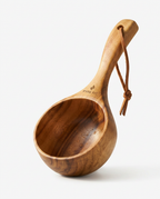 Wooden sauna water ladle with leather loop, studio packshot on white