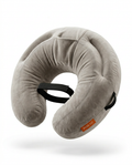 Grey hands-free comfort pillow with phone cradle and arm channels on white