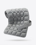 Grey quilted gel comfort pad with adjustable strap, studio shot on white