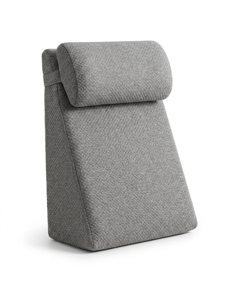 Gray ergonomic wedge backrest pillow with rolled headrest on white background