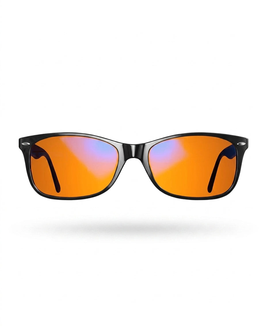 Black blue light glasses with orange tinted lenses, front studio shot on white