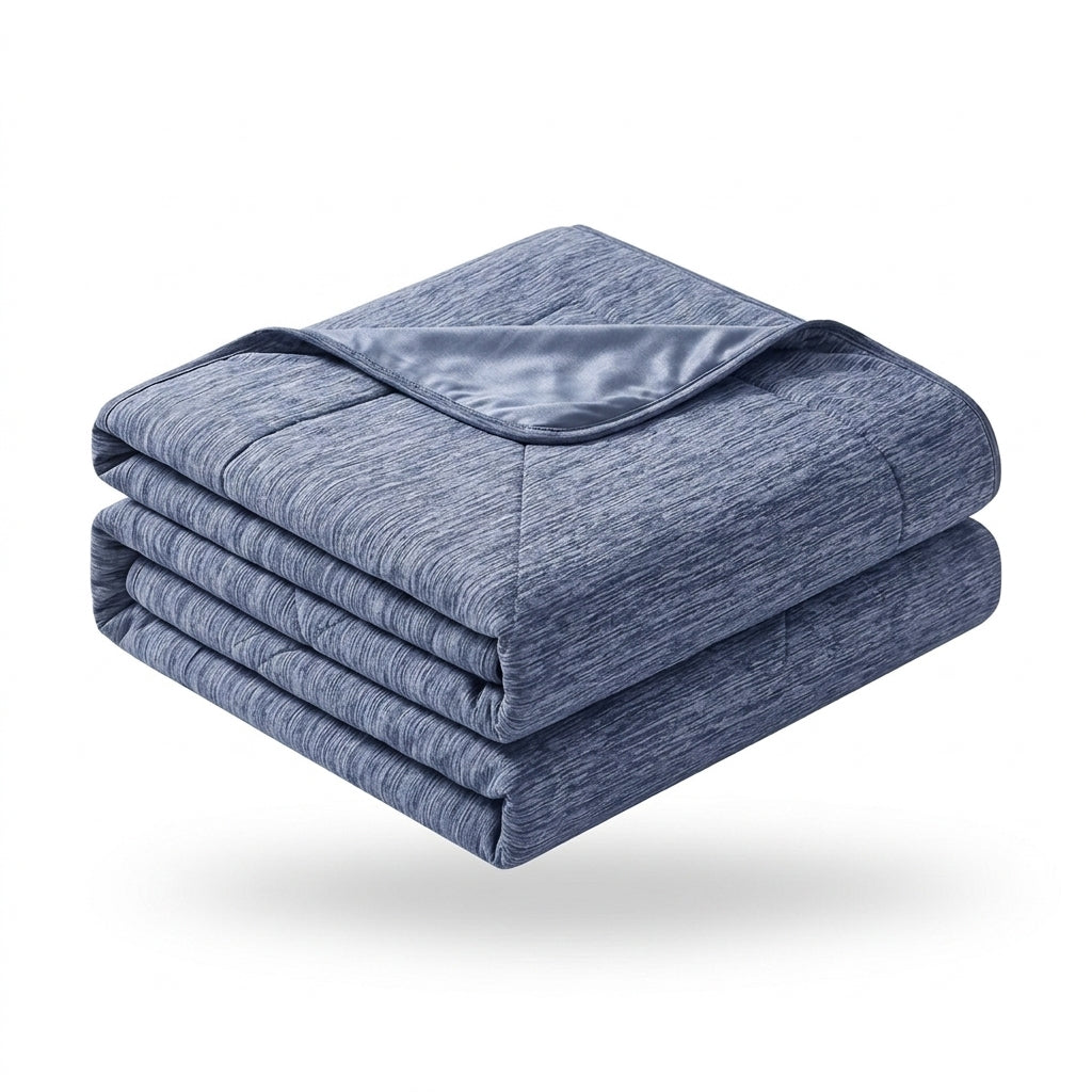 Folded blue cooling blanket showing heathered top and cool-touch backing on white