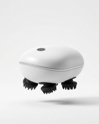 White electric scalp massager with silicone kneading claws, studio shot on white