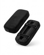 Pair of black memory foam armrest cushion pads with straps, on white