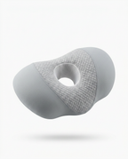 Grey memory foam side sleeper pillow with central ear cavity hole, on white