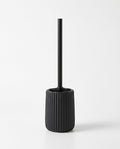 Black ribbed ceramic toilet brush holder set, studio packshot on white