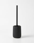 Black ribbed ceramic toilet brush holder set, studio packshot on white