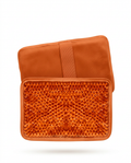 Orange hot and cold gel pack with bead pocket folded open on white
