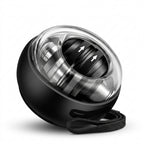 Black gyroscopic hand grip trainer ball with clear dome and wrist strap on white