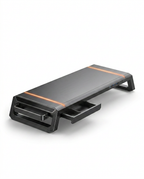 Black RGB monitor stand riser with hidden drawer, studio packshot on white