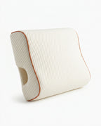 Cream ribbed couples pillow with arm tunnel cutout and orange piping on white