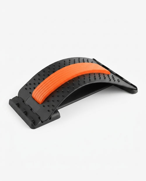 Black arched back stretcher with acupressure nubs and orange spine pad on white