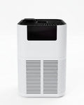 White air purifier with black top panel and front vents, studio on white