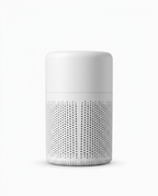 White cylindrical portable HEPA desktop air purifier with mesh body, studio shot