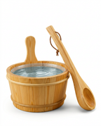 Pine sauna water bucket filled with water beside its long-handled wooden ladle on white