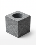 Grey granite cube essential oil holder with round recess on white