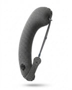 Grey inflatable travel neck pillow with valve and strap, studio shot on white