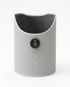 Grey fabric foldable leg warmer with digital temperature display, studio shot on white