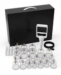 Clear cupping massage set with hand pump and case, studio shot on white