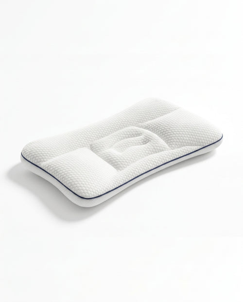 White baby head support pillow with concave cradle and navy piping, studio shot