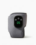 Grey heated massager wrap with green digital display and touch controls, on white