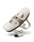 Cream waist massager belt with digital display, remote and strap, studio shot