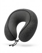 Dark grey U-shaped memory foam travel neck pillow with toggle strap, on white