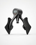 Black digital hip trainer with LCD counter and ergonomic thigh pads, studio shot