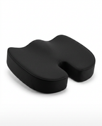 Black U-shaped memory foam seat cushion with coccyx cutout on white
