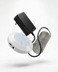 White foot spa machine with power adapter and coiled hose, studio shot on white