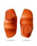 Pair of orange silicone weightlifting grip pads on white studio background