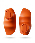 Pair of orange silicone weightlifting grip pads on white studio background