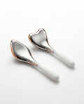 Heart and teardrop stainless steel cooling eye massage tools with white silicone handles