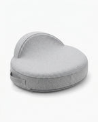 Grey curved feeding support pillow with side handle, studio packshot
