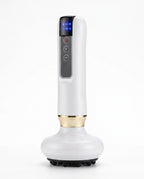 White handheld electric cupping massager standing on a suction cup base