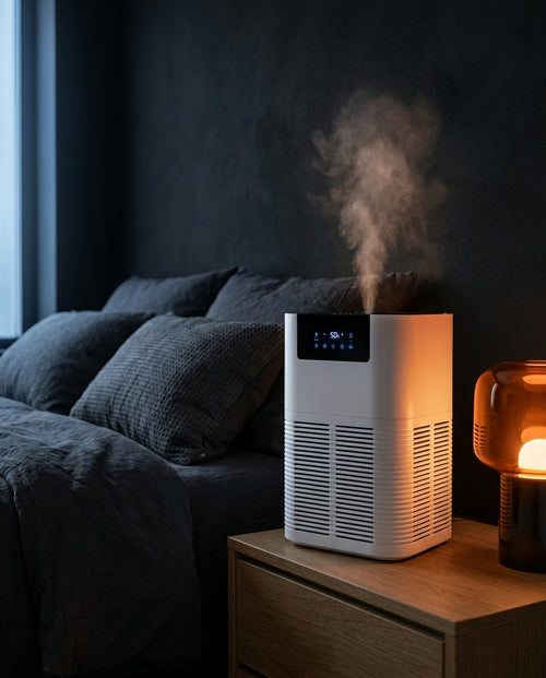 Air purifier releasing mist on a bedroom nightstand with glowing display