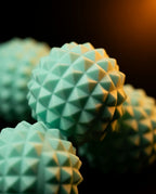 Macro of the spiked silicone texture on the green massage roller balls