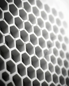 Macro of the honeycomb grille pattern on the nail dust collector